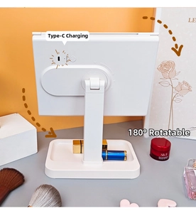 Detail view of foldable white LED makeup mirror with Type-C port and storage base