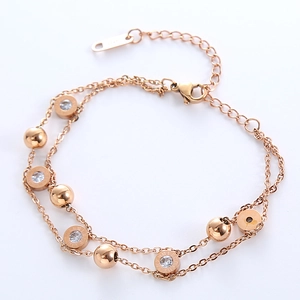Rose gold double-layer bracelet with Roman numeral ring and sparkling zircon beads