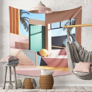 Detail of bohemian tapestry with geometric architecture and palm trees in modern home