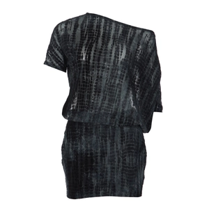 Close-up of asymmetric cut-out mini dress with textured reptile pattern and tie detail