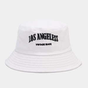 Close-up of Los Angeles vintage embroidery and stitching on white cotton bucket hat
