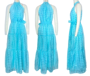 Detail view of bright blue plaid tiered maxi dress with halter neck and waist tie