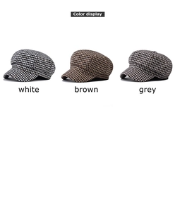 Three colors of houndstooth newsboy hats in white, brown, and grey wool fabric