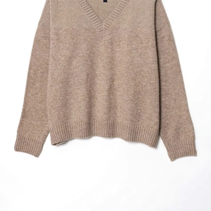 Pull en maille col V pour femme couleur avoine avec manches longues et bords-côtes