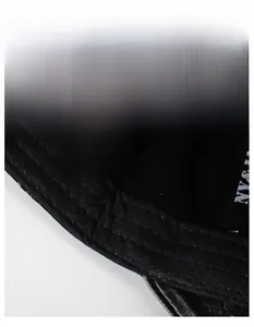 Detail of moisture-wicking sweatband and inner tag on vintage washed baseball cap