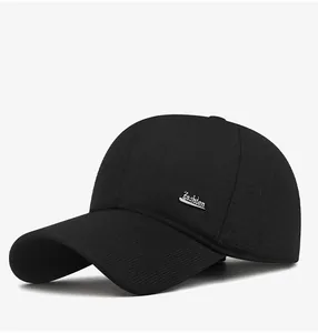 Detail of black winter baseball cap with ear protection and Fashion embroidery