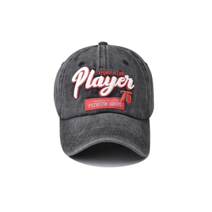 Detail of dark grey washed cotton baseball cap with 3D Player embroidery and textile label