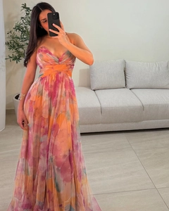 Detail of V-neck mesh dress featuring abstract pink and orange floral prints