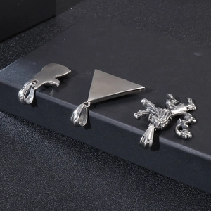 Mens stainless steel lion head and pyramid pendants set in silver finish on black background