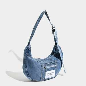 Vintage washed denim hobo shoulder bag for women with adjustable eyelet strap and zipper pocket