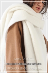 Close-up of white thick mohair scarf showing soft cashmere-like texture and large layered style