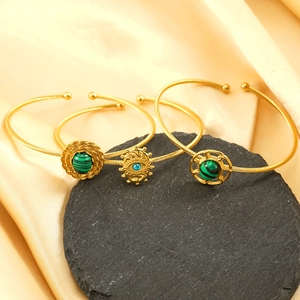 Three-piece gold titanium steel bangle set with turquoise and evil eye malachite inlays