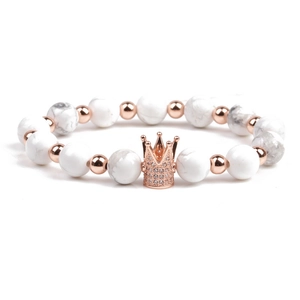Elastic crown bracelet featuring white turquoise marble beads and rose gold accents