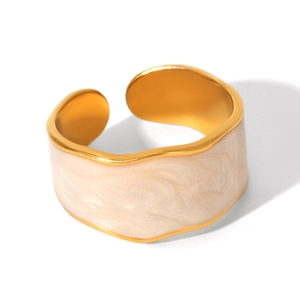Detail of adjustable gold ring with cream enamel inlay and marble texture effect