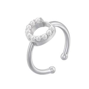 Detail of silver open ring featuring a circular design set with small white pearls