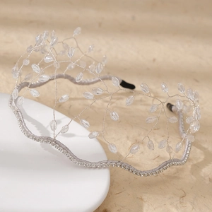 Exquisite bridal headband with crystal beads and rhinestones on silver mesh design