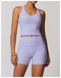 Detail of lavender criss-cross back yoga vest and high-waist shorts set for fitness