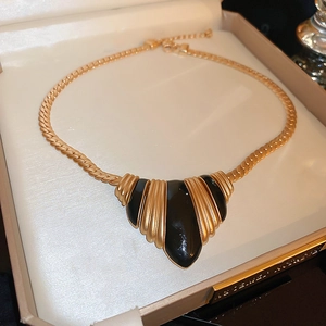 Vintage gold necklace with fan pendant in premium gift box showing elegant details
