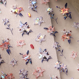 3D holographic lily flower nail stickers with pearl accents and iridescent shimmer effect