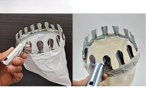 Detailed view of metal fruit picker tool head with durable collection bag and toothed ring