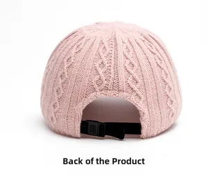 Detail view of pink cable knit baseball cap back with adjustable black strap and buckle