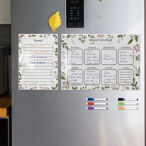 Magnetic acrylic weekly planner with floral border and color markers on fridge