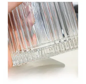 Macro shot of lead-free glass jar with vertical stripes texture for jewelry storage