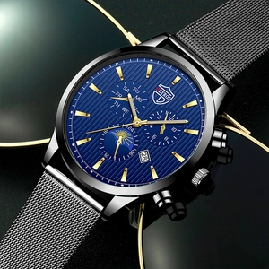 Detail view of quartz watch with blue textured dial and silver mesh strap on black surface