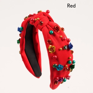 Fashionable red knotted fabric headband with metallic flowers and rhinestone accents