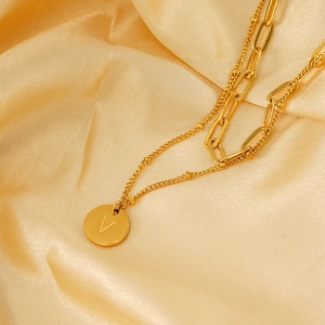 Double layered gold stainless steel necklace with paperclip chain and V letter pendant