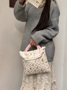 Quilted 11 inch laptop bag with cartoon bear patterns and delicate lace edge detailing