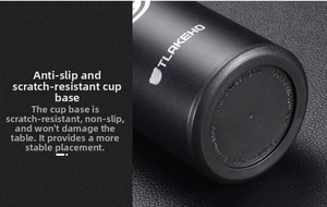 Close-up of non-slip stainless steel vacuum mug base with care instructions and logo