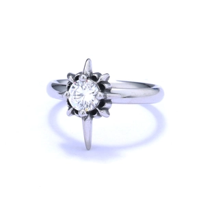 Vintage stainless steel ring featuring a hexagonal star claw setting with a clear main stone
