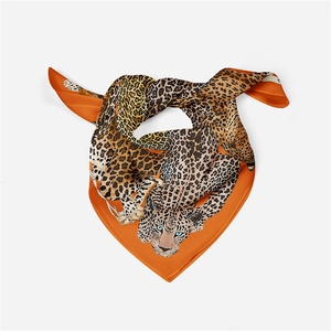 Elegant 53cm orange leopard print silk square scarf with premium twill texture and rolled edges