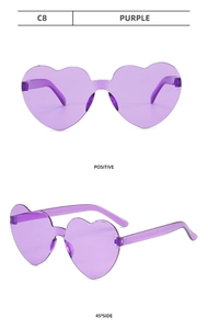 Close-up of purple heart-shaped rimless sunglasses with seamless translucent lenses