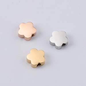 Polished flower shaped steel beads in gold, rose gold and silver for DIY jewelry making