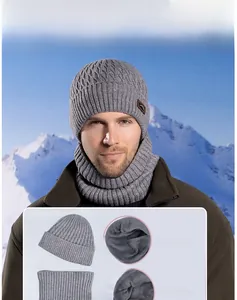 Detail view of gray winter knit hat and neck warmer set with thick fleece lining for warmth