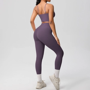 Detail view of purple double-sided brushed yoga set showing back strap design and leggings