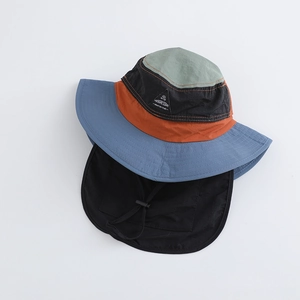 Detail of color-block hiking hat with detachable sun shield and windproof drawstring