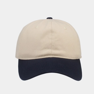 Close-up of contrast stitch baseball cap with beige crown and navy blue brim detail