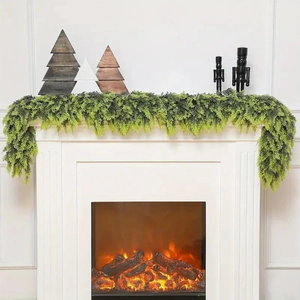 Realistic Norfolk pine Christmas garland displayed on a white mantel with festive decor