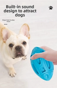 Detail showing high-quality squeaky blue rubber rugby toy for dog dental training