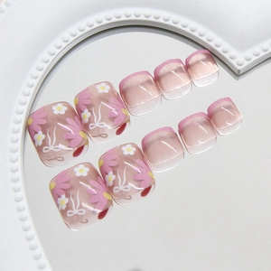 Pink French toenail press-ons with daisy flower and bow designs, 24 pieces set