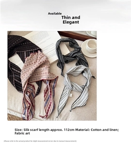 Detail of 112cm striped and floral cotton linen neck scarves on a cozy home setting