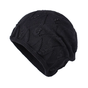 Chic black knitted slouchy beanie with stylish beaded accents and wave pattern texture