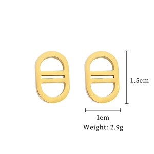 Detailed view of gold pig nose stud earrings with 1.5cm height and 1cm width dimensions