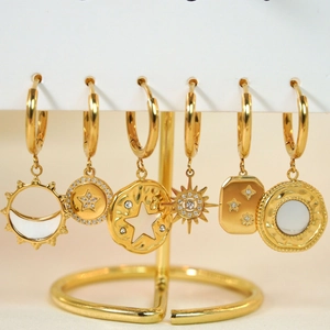 Set of six 14K gold plated stainless steel hoop earrings with celestial charms and crystals