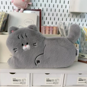 Detail of plush grey cat pencil case with 3D ears and embroidery in stationery setting