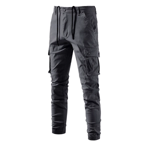 Detail of dark grey cargo pants featuring side flap pockets and elastic drawstring waist