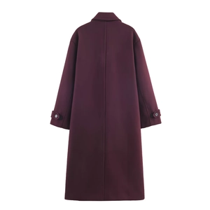 Back view of a long burgundy wool coat featuring a center seam and sleeve strap details